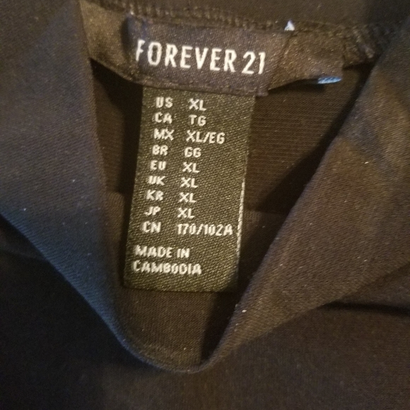 Sleeveless turtleneck bodycon dress. - Picture 3 of 3